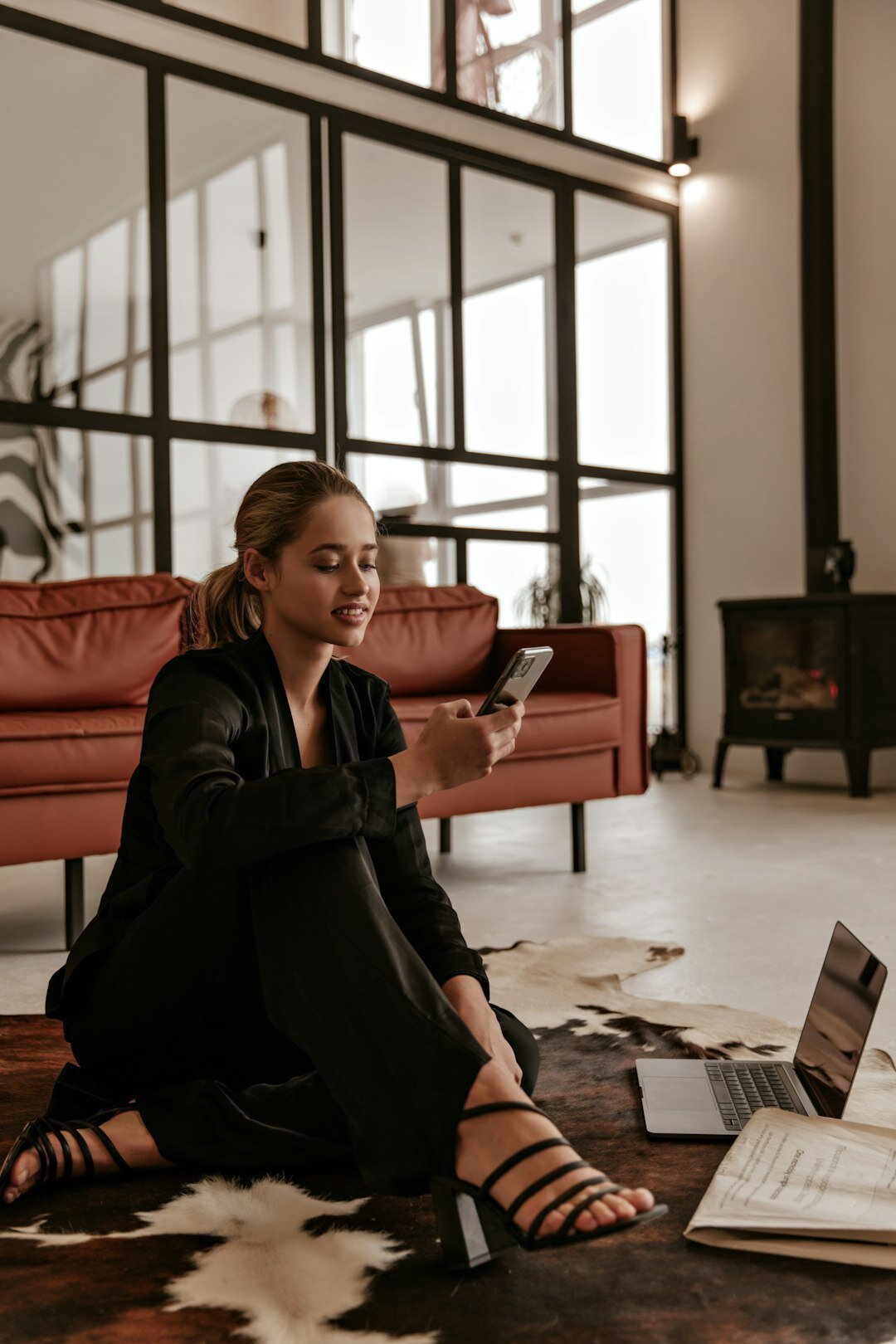 Danish woman comparing financial offers on a laptop