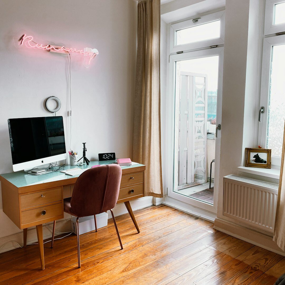 Portrait of a Danish woman content editor working at a desk