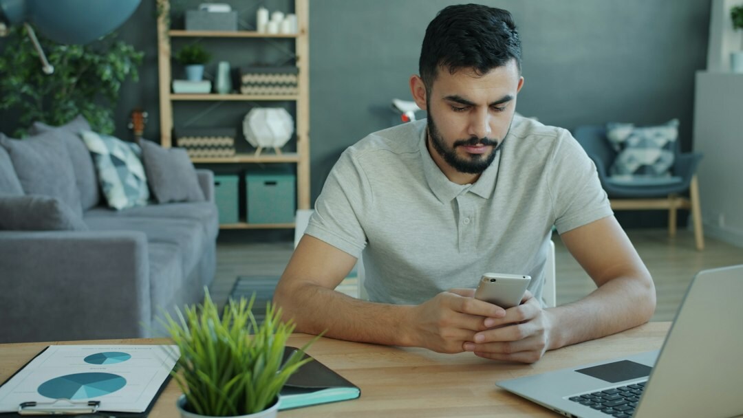 person calculating budget at home